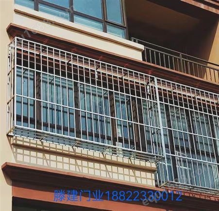 滨海新区西区卷帘门不锈钢玻璃门楼梯扶手制作安装滕建门业